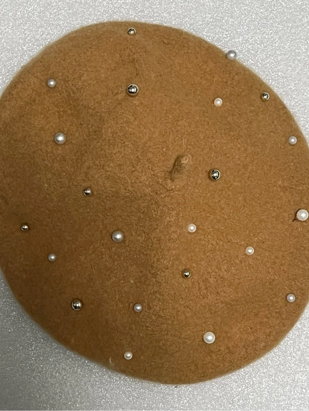 Stylish pearl-embellished camel color pearl and studded wool French beret